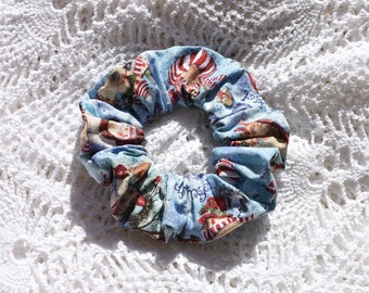 Snowmen sledding in snow on sparkle blue Christmas Fabric Hair Scrunchie santa claus jolly holiday, gifts for her, xmas, womans acceessory