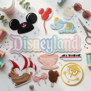 May include: A collection of embroidered patches featuring the word Disneyland in pastel colors, a black mouse ear hat, a red balloon, Dumbo, a cupcake, a ship, a teacup, a monorail, a pink bow, a chocolate treat, and a yellow circular icon.