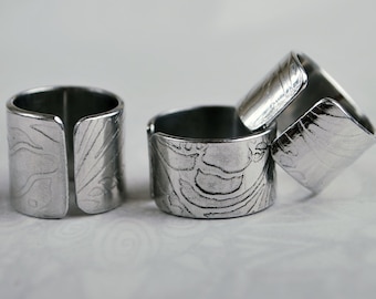 iris design embossed adjustable ring silver aluminium
