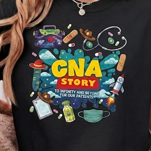 May include: A black t-shirt featuring a colorful graphic with the text "CNA STORY TO INFINITY AND BEYOND FOR OUR PATIENTS". The design includes illustrations of a stethoscope, a rocket, a medical mask, a clipboard, pills, and cowboy hats.