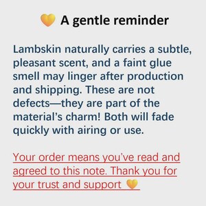 May include: A white informational card with a yellow heart icon and the text: A gentle reminder. Lambskin naturally carries a subtle, pleasant scent, and a faint glue smell may linger after production and shipping. Your order means you've read and agreed.