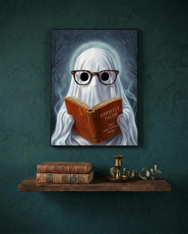The ghost reading print on a deep teal wall above a narrow shelf with antique books and a brass candlestick