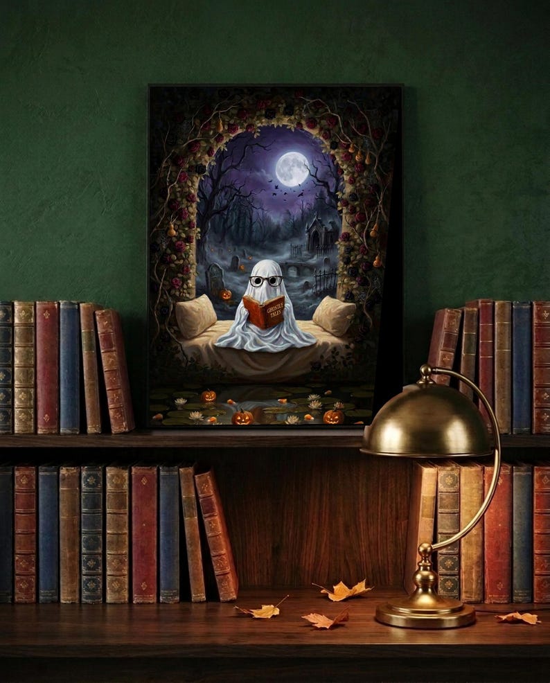The graveyard arch ghost reading print framed and leaning on a dark wood library shelf against a deep green wall
