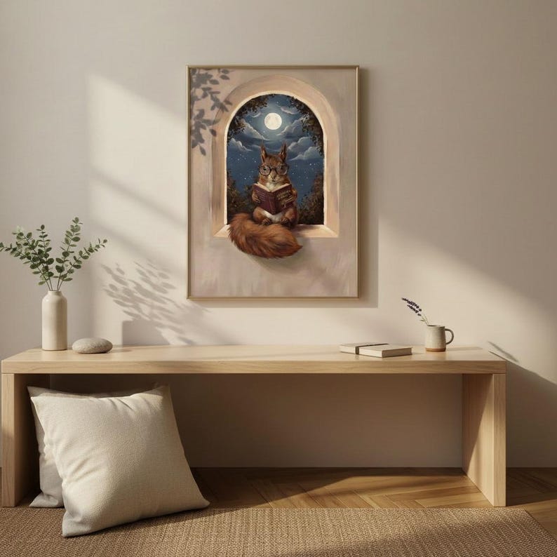 Squirrel wall art framed above a restrained pale desk with a natural linen runner