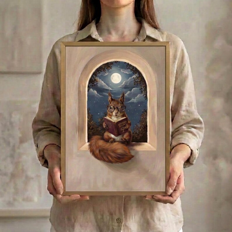 A person holding the framed squirrel reading print, showing its scale against the body