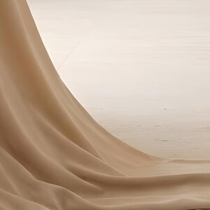 Detail from You Are Allowed to Pause, a cropped fragment of the printable artwork: a length of sheer linen falling and pooling across a pale wood floor, with no lettering in view.