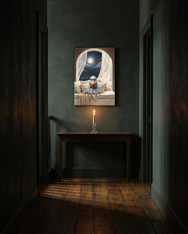 The moonlit bed ghost reading print framed alone in a dim charcoal-green hallway above a console with a single lit candle