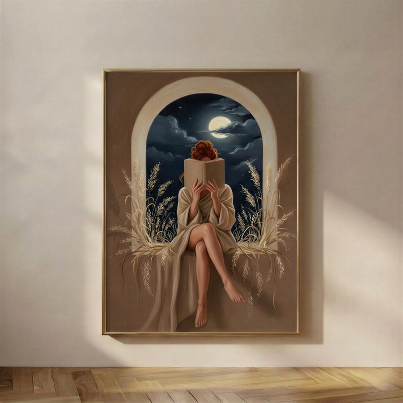 Painterly print of a woman in a cream robe reading a book by an arched window, a full moon and navy night sky behind her, dried grasses at the sill, framed on a warm plaster wall