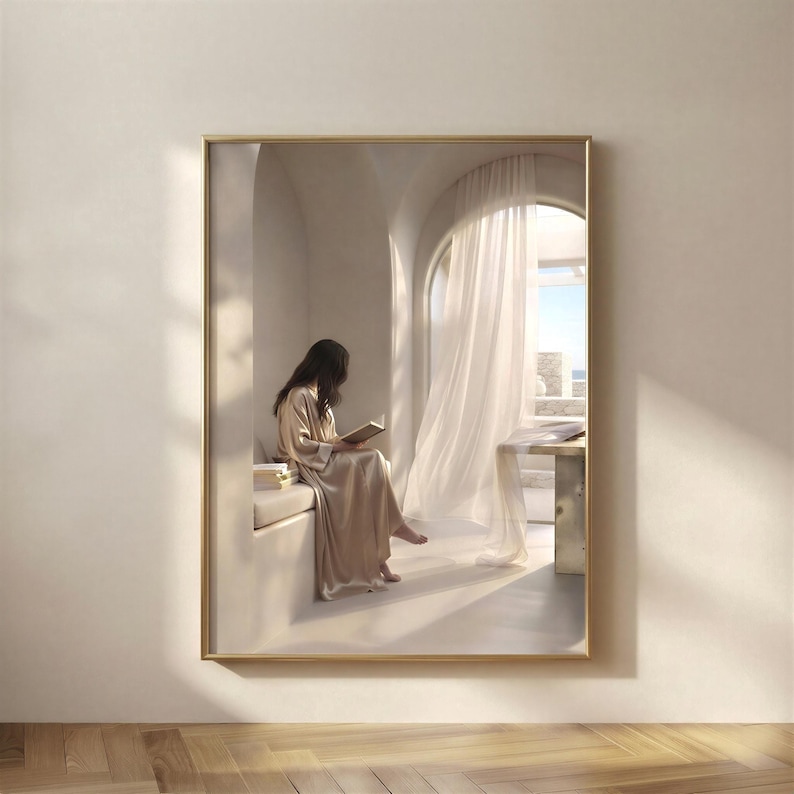 Framed print of a woman in a silk robe reading by an arched window, sheer curtain drifting beside her, hung on a warm plaster wall above a pale oak herringbone floor. neutral printable wall art, minimalist home decor, Japandi style, calm living room and bedroom decor, slow living digital download.