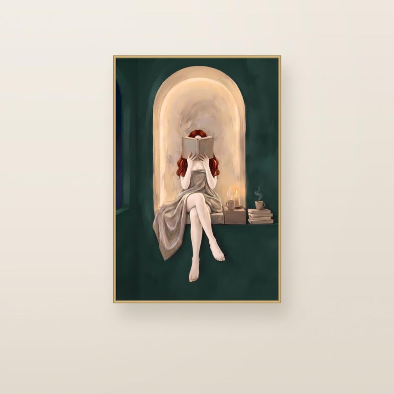 Red-haired woman reading in an emerald green arched nook. Emerald green printable wall art shown framed on a plain wall.