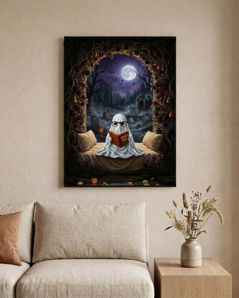 The graveyard arch ghost reading print framed in a calm neutral living room above a linen sofa