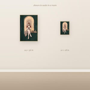 Scale comparison showing the red-haired woman reading in an emerald green arched nook art print at 24x36 inches next to 12x18 inches on a wall.