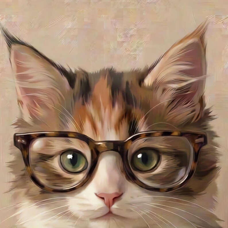 Close crop of the painted calico kitten's face, green eyes and round tortoiseshell glasses