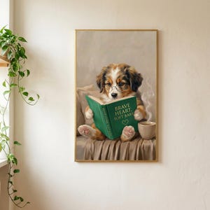 The puppy print in a thin gold frame, full bleed with no mat, on a soft plaster wall