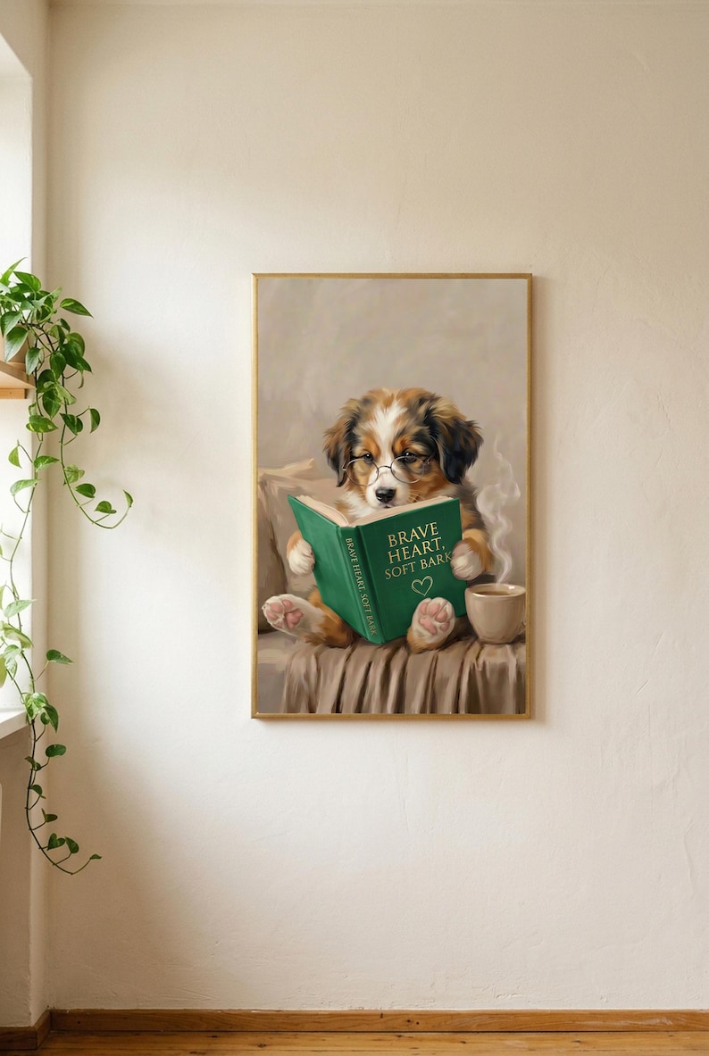The puppy print in a thin gold frame, full bleed with no mat, on a soft plaster wall