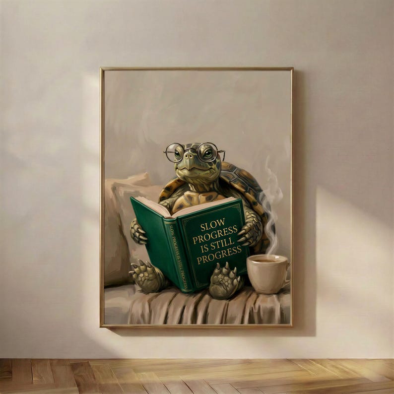 Painterly print of a tortoise in round glasses reading a green book titled Slow Progress Is Still Progress, framed on a warm plaster wall