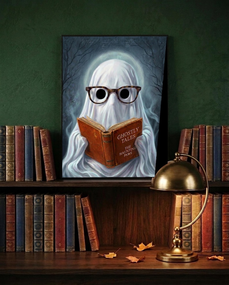 Painterly print of a small ghost in round tortoiseshell glasses reading a clothbound book titled Ghostly Tales, on a moonlit night background, framed on a dark green library shelf