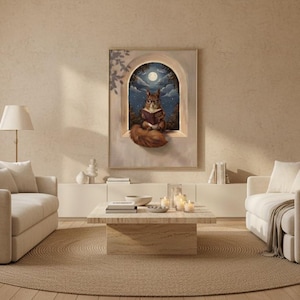 Wide view of a neutral living room with the squirrel reading print framed above a low linen sofa in soft daylight