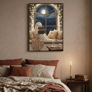 The window seat coffee ghost reading print framed above a bed with linen bedding and a lit candle on the nightstand