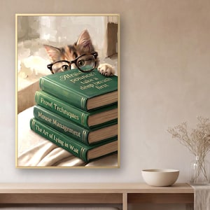 Wide view of a bare plaster wall with the framed cat peeking over books print above a long pale oak console holding a cream bowl, a glass vase of dried gypsophila and a folded linen runner.