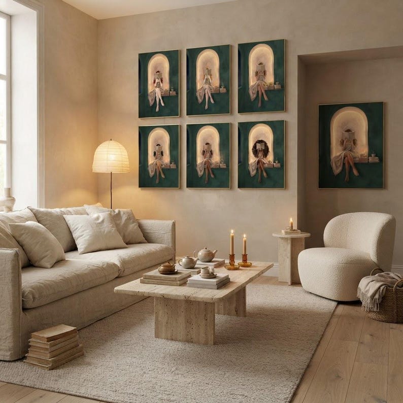 Six emerald green reading nook art prints as a three by two gallery wall in a bright living room, with a seventh in the alcove beyond, a linen sofa and a boucle chair.