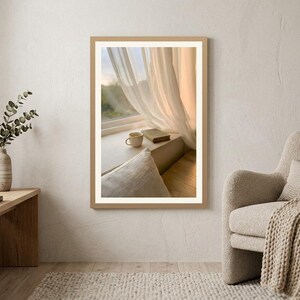 Window seat wall art print in cozy living room with armchair and knit throw, book and coffee on ledge with sheer curtains, Japandi Scandinavian interior, beige neutral minimalist decor, eucalyptus and wooden furniture, slow living home accent, digital printable