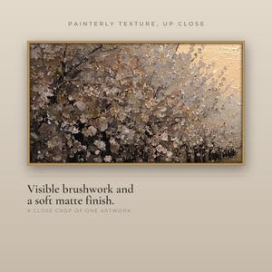 Close crop of one artwork in a gold frame, a blossoming tree in soft light, showing the visible brushwork and soft matte finish of the painterly texture