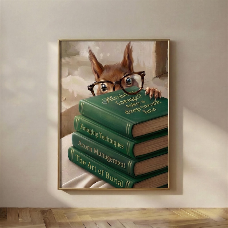 Painterly print of a bright-eyed reddish-brown squirrel with round glasses peeking over a stack of books titled Afraid to Forage?, framed on a warm plaster wall