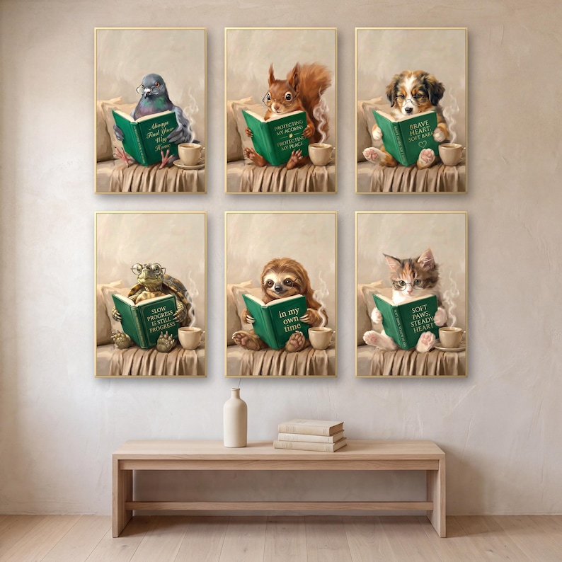 Gallery wall of six painterly prints: a pigeon, squirrel, puppy, tortoise, sloth and kitten, each in round glasses reading a green book with gold lettering, framed in a grid on a warm plaster wall