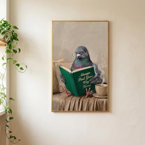 The pigeon print in a thin gold frame, full bleed with no mat, on a soft plaster wall
