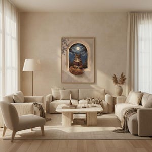 The squirrel reading print framed in a calm light-filled living room with warm plaster walls and a linen sofa