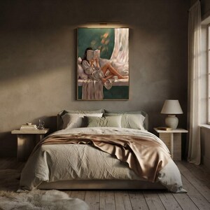 Emerald green wall art framed above an upholstered linen bed with a champagne satin throw, a warm picture light, and nightstands styled with books and a small glass jug.