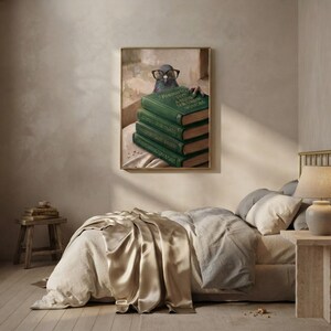 Pigeon peeking over books art print framed on a textured plaster bedroom wall above linen bedding in soft morning light