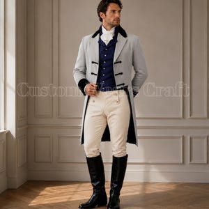 May include: A light grey tailcoat with black velvet lapels and cuffs, worn over a navy blue waistcoat with silver buttons, a white cravat, cream-coloured trousers, and black knee-high boots. The ensemble features a structured, formal design.