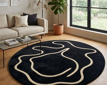 Modern Circular Statement Rug: Black with Cream Fluid Art Design