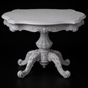 May include: A light gray pedestal table featuring a scalloped tabletop edge and intricate carved floral and scrollwork detailing along the apron. The central column is fluted and rests on four ornate, curved legs with detailed leaf carvings.