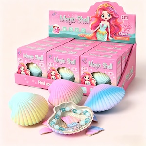 May include: A pink display box of "Magic Shell" toys. Each box contains a seashell-shaped container with a bracelet inside. The boxes feature a mermaid illustration and are suitable for ages 4+. Some shells are open, revealing the jewelry.