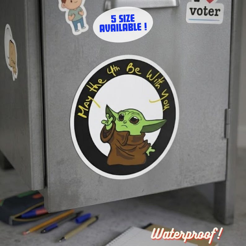 May include: A circular sticker with a green alien character in a brown robe, and the phrase "May the 4th Be With You." The sticker has a black border and is on a metal surface. Text reads "5 SIZE AVAILABLE!" and "Waterproof!"