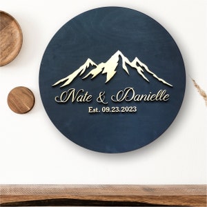 Personalized round sign with mountains, last name sign, wedding guest book alternative, engagement or anniversary gift, our adventure sign