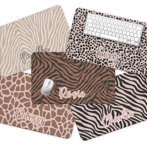 May include: Set of six mousepads with different animal print designs. Each mousepad features a different name: Daisy, Rosie, Roxy, Charlie, and two with the name Molly.