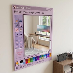 May include: A rectangular wall mirror designed to resemble the classic Microsoft Paint computer software interface. The frame is light purple with a toolbar on the left, a color palette at the bottom, and the text untitled - Paint at the top.