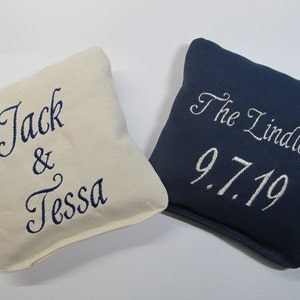Personalized Wedding Cornhole Game Bags - Couple&#39;s Names, Last Name and Wedding Date - Set of 8 Shown in Ivory and Navy Blue