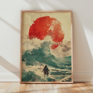 May include: Framed art print depicting a person wading through large ocean waves under a large red sun. The artwork features a vintage aesthetic with a color palette of red, teal, and beige. The print is encased in a light brown wooden frame.