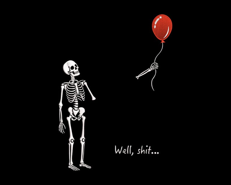 May include: A graphic illustration on a black background featuring a white skeleton looking up at a red balloon held by a detached skeletal hand. The text "Well, shit..." is printed in white below the balloon and the skeleton.