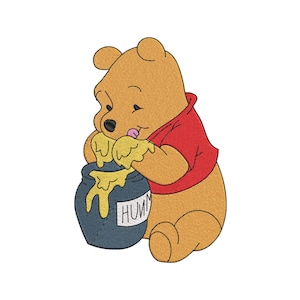 May include: An embroidered design of a golden-yellow bear wearing a red shirt, sitting and eating yellow honey from a dark blue pot. The pot features a white label with the black text HUMM visible on the front, with honey dripping down.