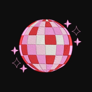 May include: An embroidered disco ball design featuring a grid of square patches in shades of red, light pink, and white. The circular object is surrounded by six small, four-pointed star shapes in a matching pink thread on a black background.