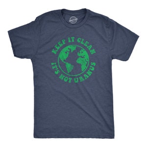 May include: A dark blue t-shirt with a green circle graphic that says "Keep it clean, it's not Uranus" with a green image of the Earth inside the circle.