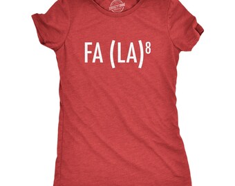 May include: A heather red short-sleeve t-shirt with a crew neckline. The front of the shirt features the white printed text FA (LA)8 centered on the chest. The fabric has a visible heathered texture throughout the garment.