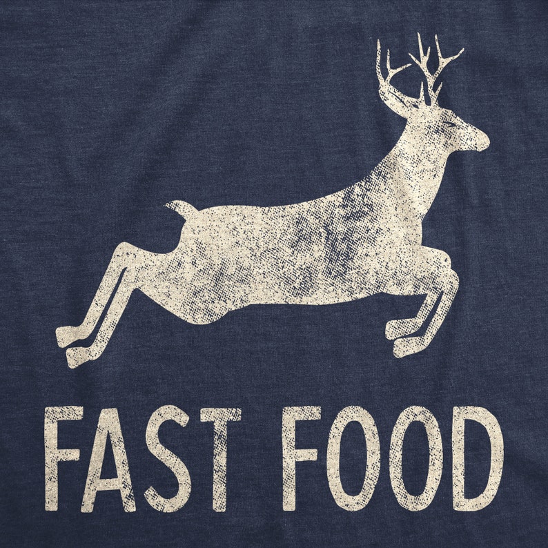 May include: A navy blue t-shirt with a white silhouette of a deer jumping and the text "FAST FOOD" printed on the bottom.