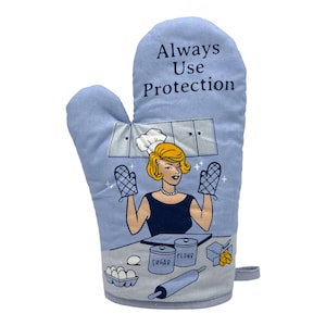 May include: A light blue oven mitt featuring the text Always Use Protection in dark blue letters. The graphic depicts a blonde character in a black top wearing a chef hat, holding two oven mitts, with kitchen items like sugar, flour, and a rolling pin.